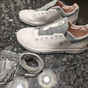 On Running White and Gray Sneakers